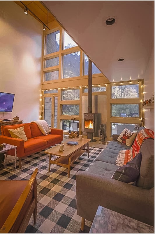 High ceilings and modern decor inside this New England cabin rental