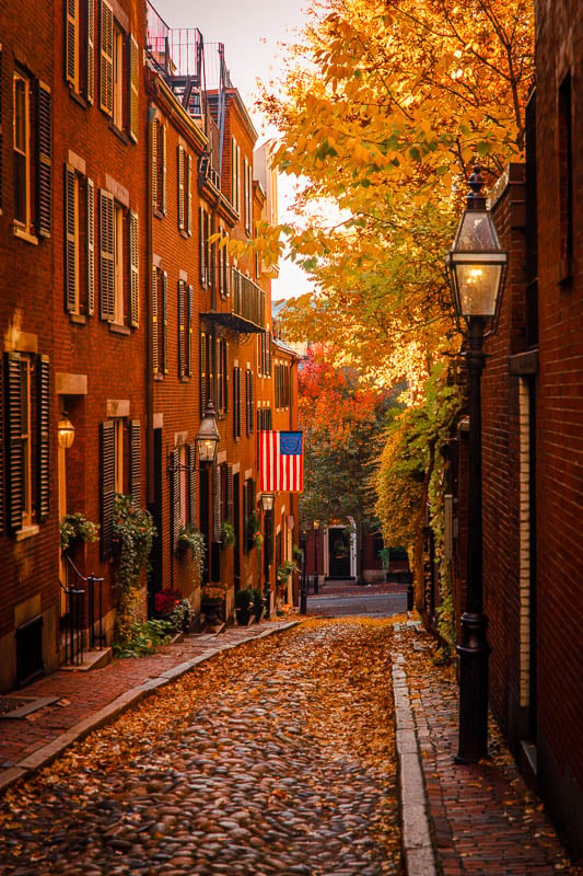 Hanging out with friends and taking pictures on Acorn Street is a popular activity in Boston