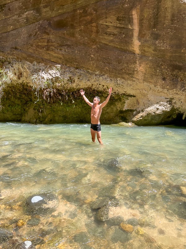 Taking a dip in an ice cold river in Zion National Park.