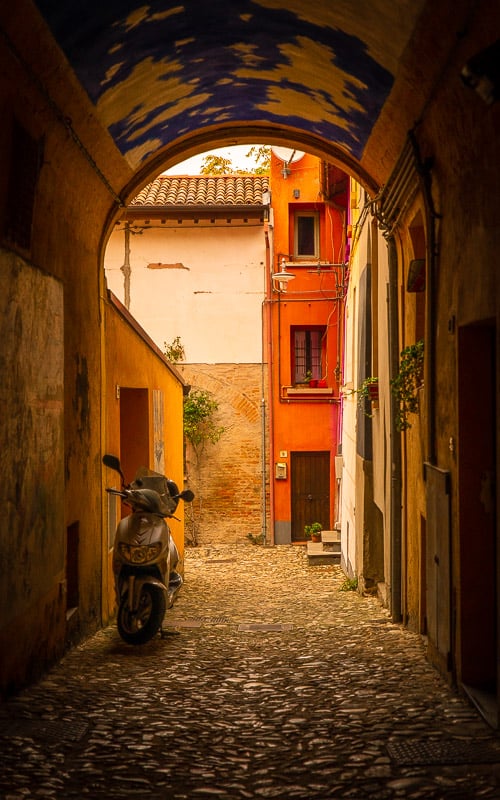 Dozza is so vibrant and colorful that it makes you wonder if each of the homes inside its old walls are also splashed with paint during the Biennale del Muro Dipinto.