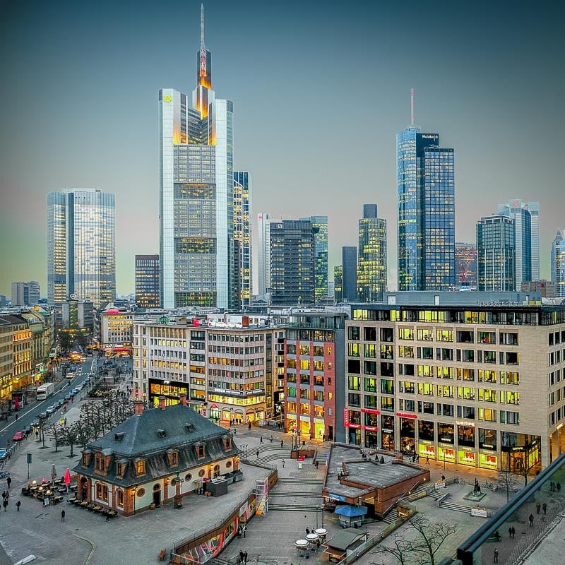 Frankfurt is a bustling financial center in Europe with cheap flights from the US and other countries.