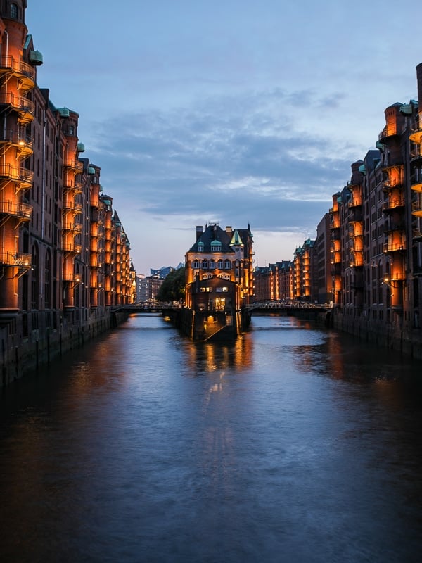 The Speicherstadt is beautiful during “blue hour,” right after sunset, when the lights switch on!