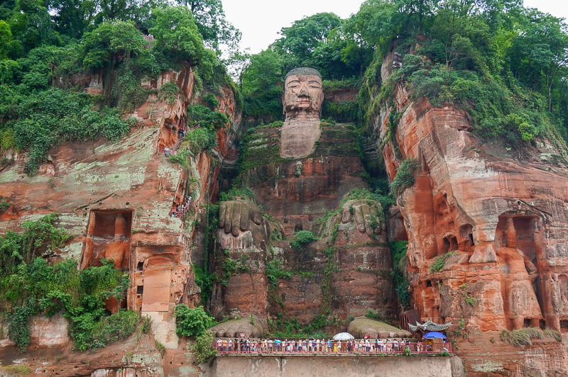 The Leshan Giant Buddha in China is absolutely massive. It's among the most popular heritage sites in China.