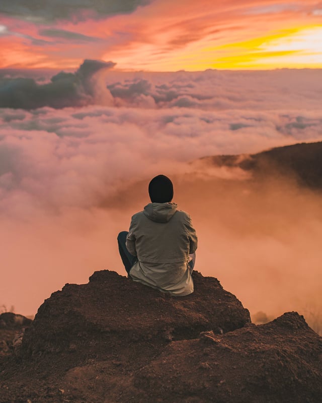 Meditating on a mountaintop