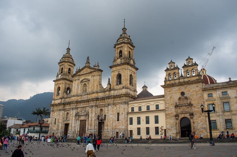 Today, tourists, street sellers, and pigeons flock to the Plaza de Bolívar, where its colonial-era architecture brings a European flair to the Colombian capital.
