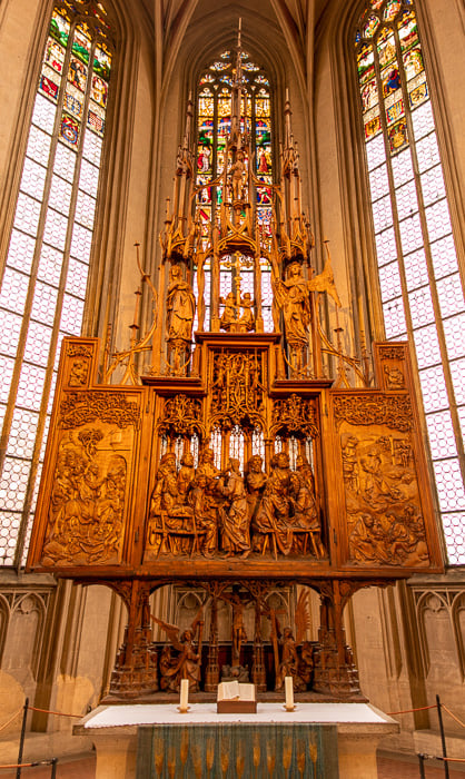The Altar of the Holy Blood was carved by Tilman Riemenschneider, a famous German sculpture and wood carver from the 15th century.