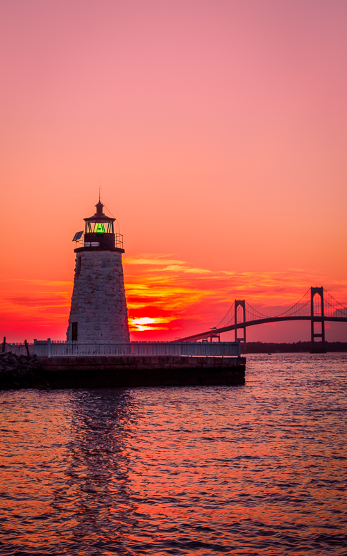 View of Newport Harbor Lighthouse and Claiborne Pell Bridge.