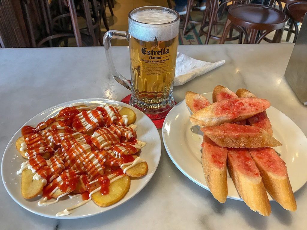 patatas bravas and pan con tomate is a must during a long weekend in Barcelona
