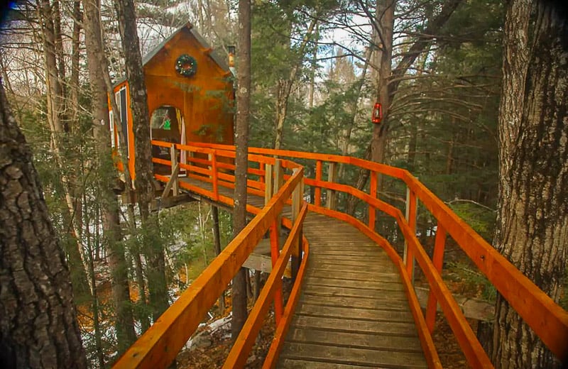 This treetop treehouse is among the most unique Airbnbs in New Hampshire and New England.