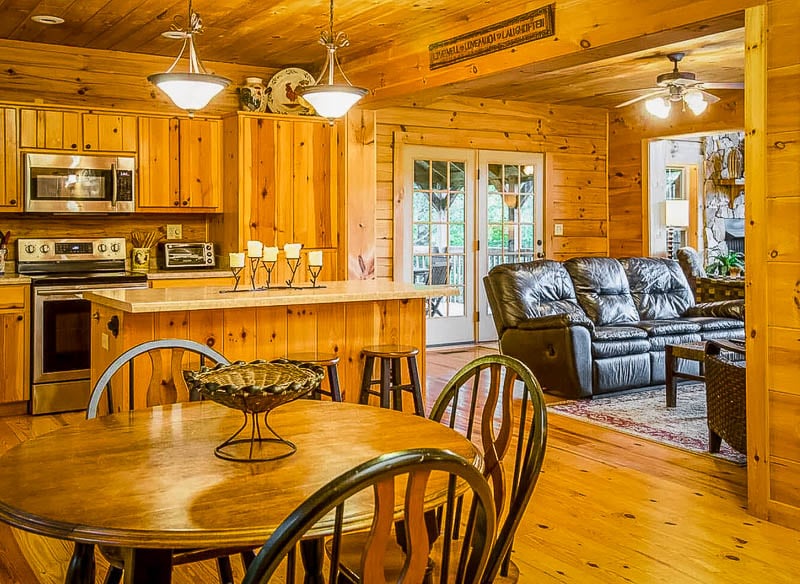 Log cabin with modern furniture and other amenities
