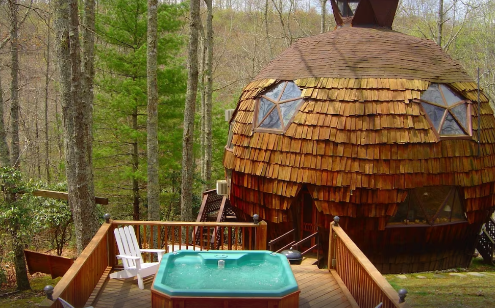Private Dome with hot tub and a view of the forest in North Carolina.